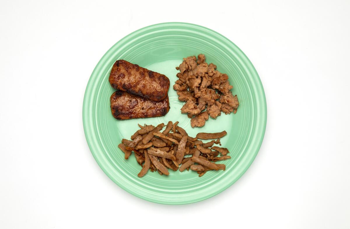 From top left, OmniPork plant-based meat-style luncheon, ground plant-based pork and plant-based pork-style strips.