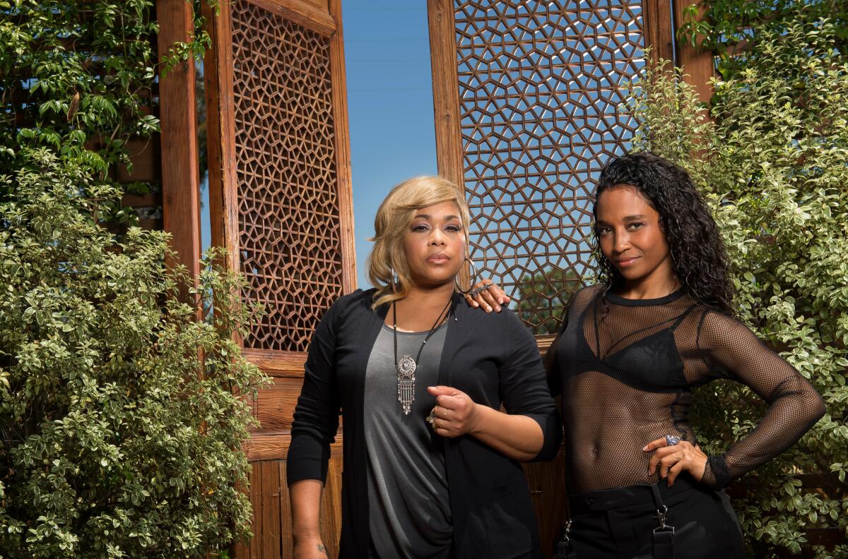 Surviving members of TLC Tionne "T-Boz" Watkins, left, and Rozonda "Chilli" Thomas are photographed in Studio City. The duo's self-titled album is their first since losing TLC founding member Lisa “Left Eye” Lopes in a 2002 accident. (Christina House / For The Times)