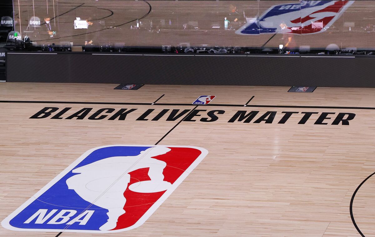 An empty court and bench in the NBA bubble in Florida.