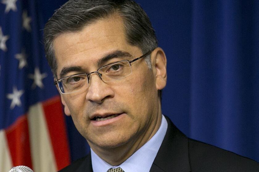 FILE - In this Jan. 24, 2018 file photo California Attorney General Xavier Becerra responds to a question during a news conference in Sacramento, Calif. Becerra and 15 other state attorneys general filed a motion to intervene in a Texas lawsuit to invalidate former President Barack Obama's health care overhaul, Monday, April 9, 2018. (AP Photo/Rich Pedroncelli, File)