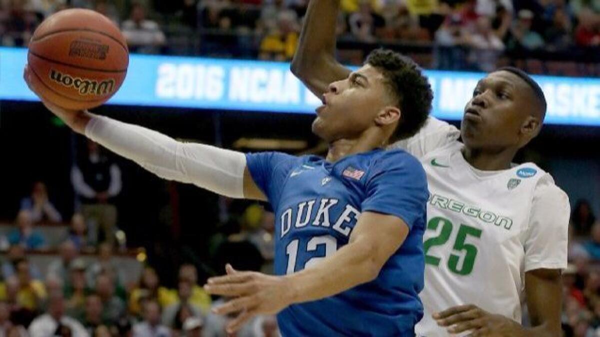 USC will add Duke transfer Derryck Thornton, seen here driving past Oregon forward Chris Boucher during an NCAA tournament game in Anaheim on March 24, 2016.