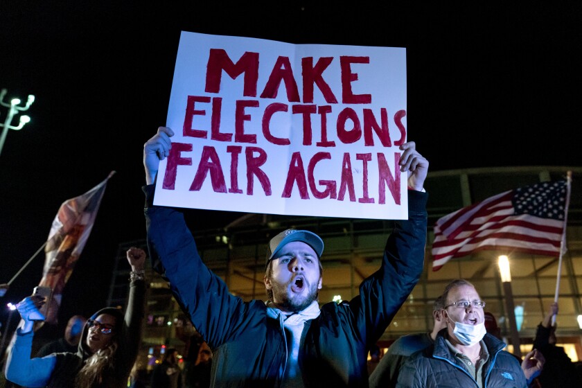 Supporters of then-President Trump chant during a protest in 2020. 