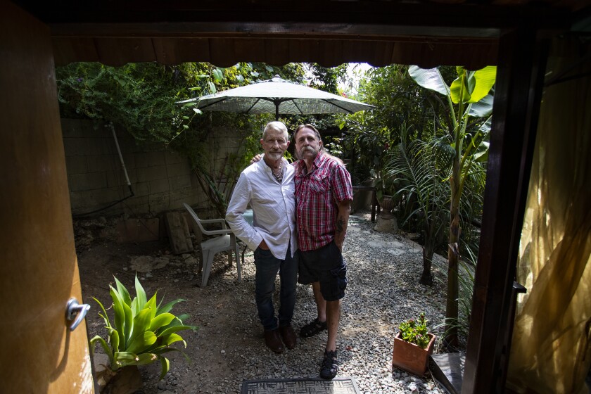 Dehner, left, and S.R. Sharp, his partner of 20-plus years, the Tom of Finland Foundation vice president.