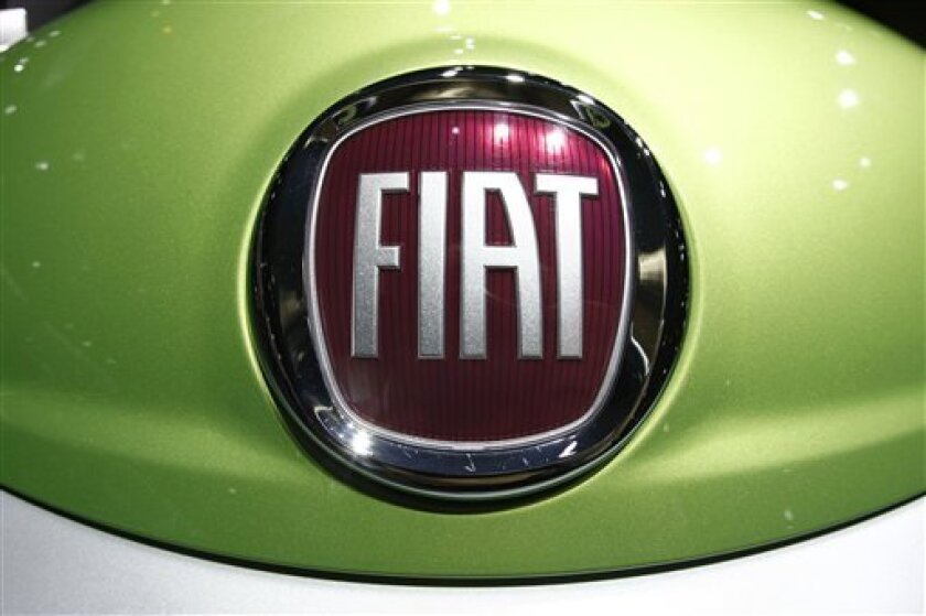 FILE - In this Sept. 23, 2008 file photo, the emblem of Fiat is pictured on a commercial vehicle at the 62st IAA International Motor Show Commercial Vehicles in Hanover, northern Germany. Italian automaker Fiat Group SpA will sign paperwork to become a partner with Chrysler LLC by Thursday, April 30, 2009, according to three people briefed on the deal. The partnership is the last piece of a huge restructuring plan needed to keep Chrysler alive as it approaches Thursday's government deadline to cut labor costs, slash debt and take on a partner. (AP Photo/Joerg Sarbach, File)