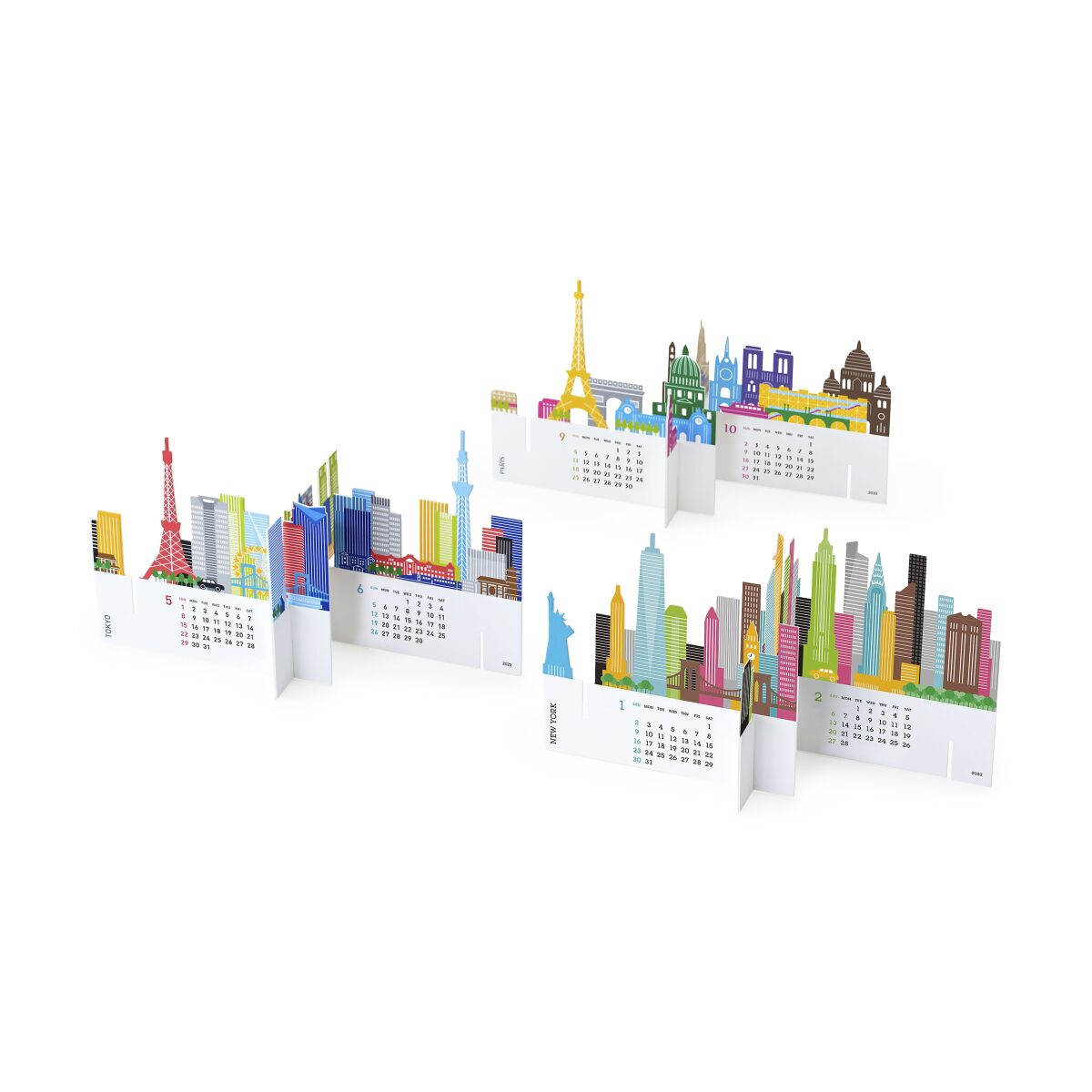 This image provided by MoMA Design Store shows a city landscape calendar. A great-looking desk calendar offered at MoMA from Japanese studio Good Morning features 3D cityscapes of Tokyo, New York and Paris. Interlock the shapes on the provided display stand to showcase the 12 monthly calendars and the skylines. (MoMa Design Store via AP)