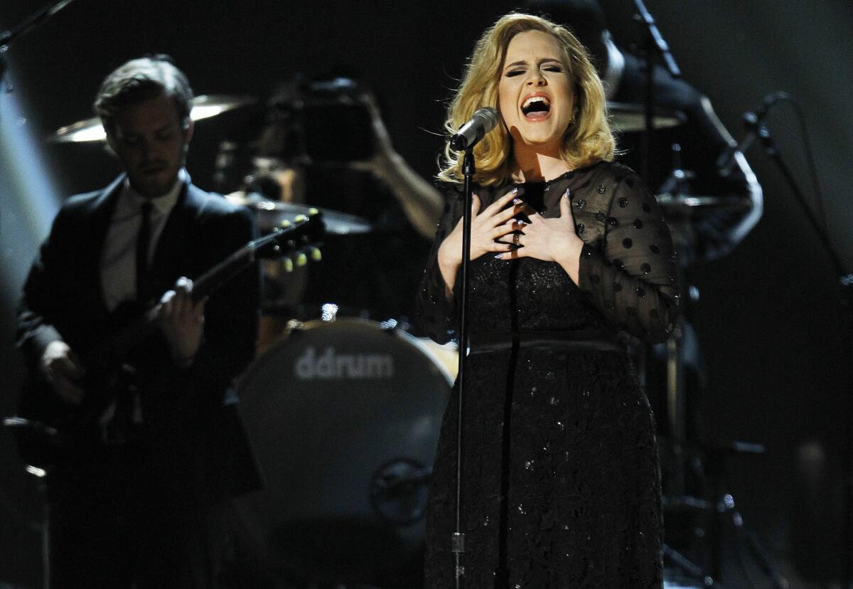 Adele, who is represented by Beggars Group, performs during the Grammy Awards at Staples Center on Feb. 12, 2012.