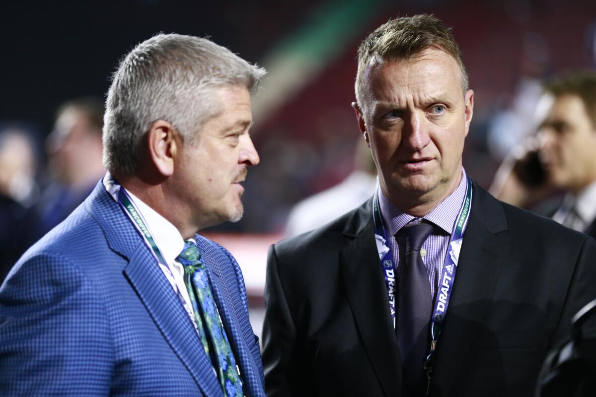 First-year Kings coach Todd McLellan, left, and general manager Rob Blake attend the 2019 NHL Draft at Rogers Arena in Vancouver on June 21.