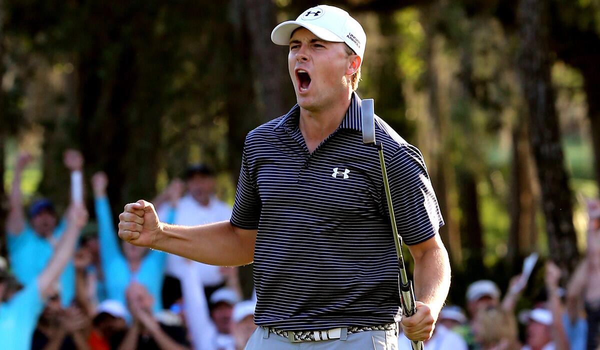 Jordan Spieth celebrates after a birdie putt on the third playoff hole to win the Valspar Championship during the final round at Innisbrook Resort Copperhead Course on Sunday.