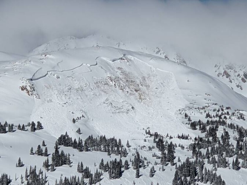 This image provided by Colorado Avalanche Information Center shows an avalanche that killed an unidentified snowboarder on Sunday, Feb. 14, 2021, near the town of Winter Park in Colorado. The deaths of two Colorado men caught in avalanches and a third in Montana over the frigid Presidents Day weekend underscore the danger of backcountry conditions in the Rocky Mountains, where skiers and snowboarders risk triggering exceptionally weak layers of snow that are the most hazardous conditions in a decade (Colorado Avalanche Information Center via AP)