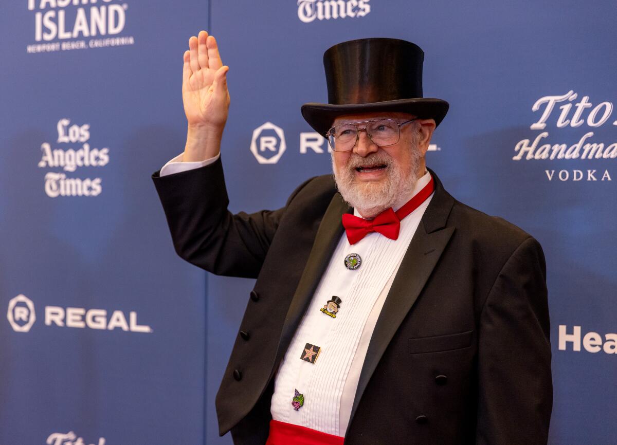 Dr. Demento, a subject of "WEIRD: The Al Yankovic Story," waves during opening night of the Newport Beach Film Festival.