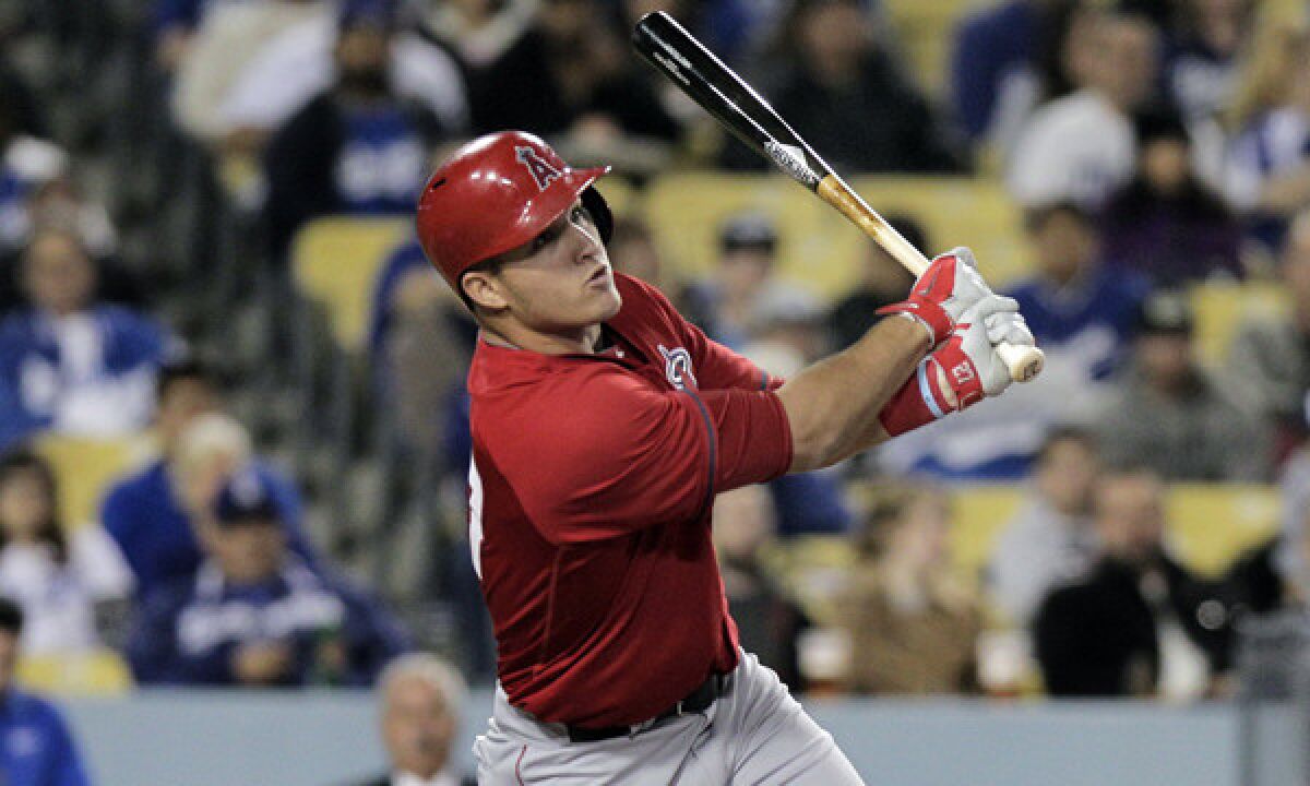 Outfielder Mike Trout agreed to a six-year, $144.5-million contract with the Angels on Friday.
