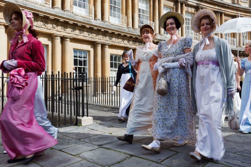 People dressed in period costume for the Jane Austen Festival in Bath, England.