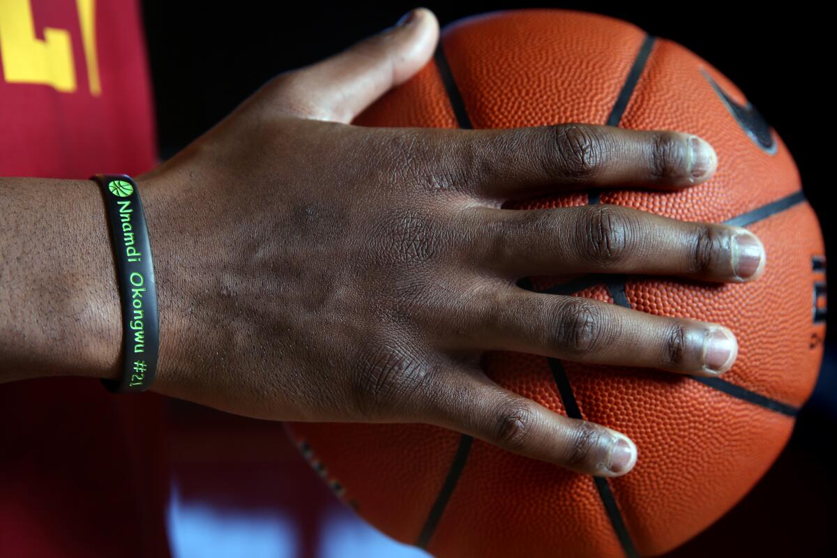 USC freshman Onyeka Okongwu, a potential top-10 draft pick this summer, wears a bracelet and the No. 21 jersey that honors his brother who died in 2014 after a skateboarding accident.