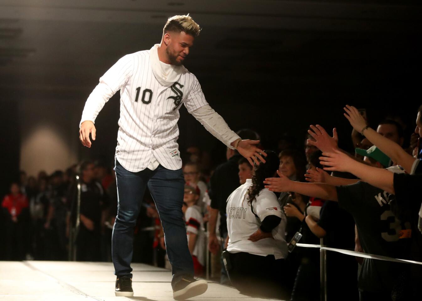 White Sox second baseman Yoan Moncada high-fives fans during opening ceremonies for SoxFest 2019 on Jan. 25, 2019, at the Hilton Chicago.