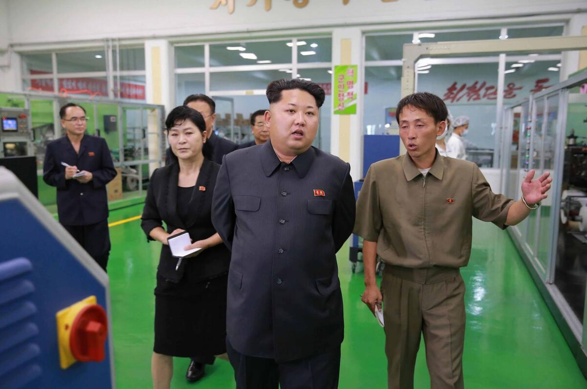 This photograph recently released by North Korea's official news agency shows North Korean leader Kim Jong-Un inspecting a factory in Rangnang.