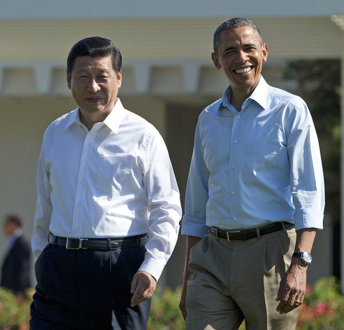 President Barack Obama is seen with Chinese President Xi Jinping at the Annenberg Retreat of the Sunnylands estate in Rancho Mirage, Calif.