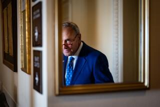 WASHINGTON, DC - AUGUST 07: Senate Majority Leader Chuck Schumer (D-NY) seen reflected in a mirror departs a news conference on the passage of the Inflation Reduction Act at the U.S. Capitol on Sunday, Aug. 7, 2022 in Washington, DC. The Senate worked overnight Saturday into Sunday as they moved toward final passage of Senate budget reconciliation deal, which Senate Democrats have named The Inflation Reduction Act of 2022. The final vote was 51-50, with the tie-breaking vote being cast by Vice President Kamala Harris. (Kent Nishimura / Los Angeles Times)