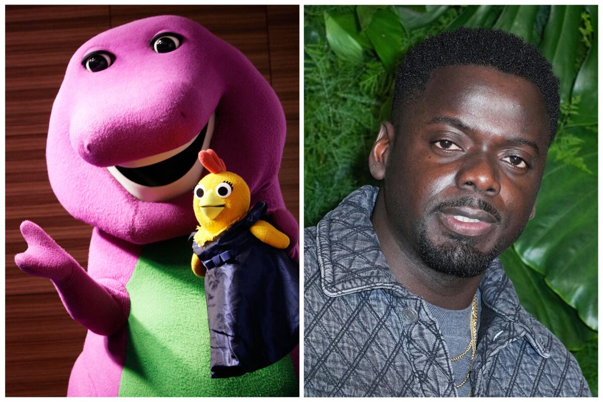Barney the purple dinosaur on the left smiles, and Daniel Kaluuya poses in front of green plants wearing a gray jacket.