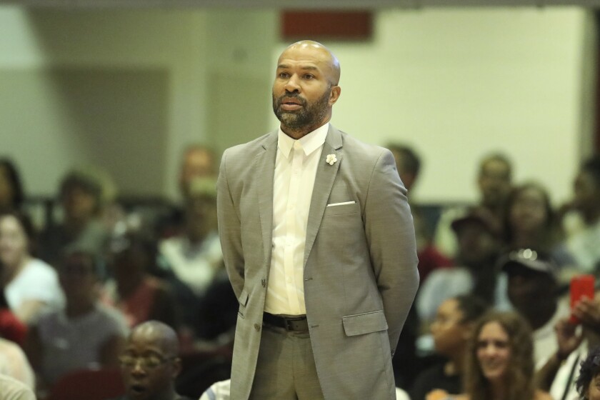 Sparks head coach Derek Fisher is seen on the sidelines against the New York Liberty during a game on July 20 in White Plains, N.Y.