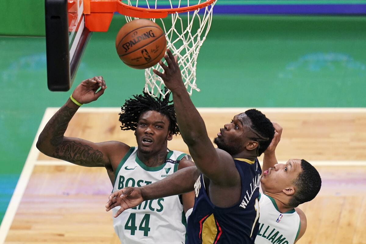 Boston Celtics' Robert Williams dunked on Grant Williams in