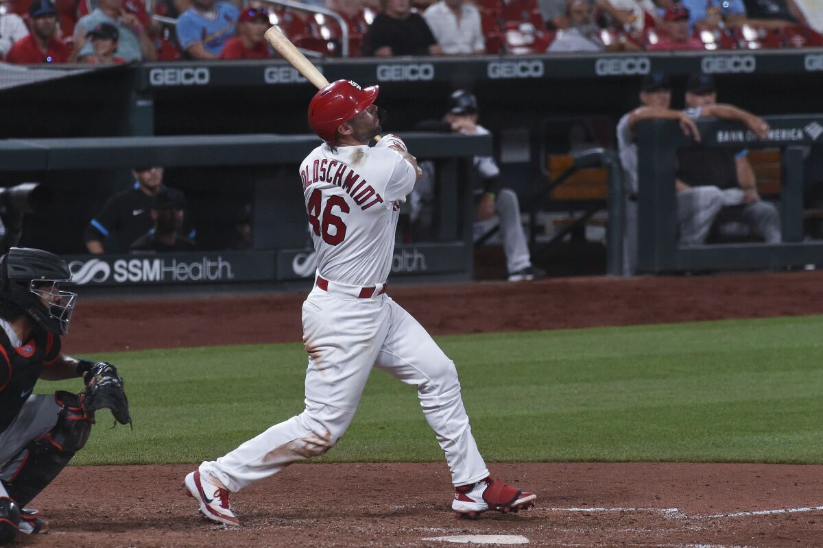 St. Louis Cardinals' Paul Goldschmidt watches his game-ending home run during the ninth inning of the team's baseball game against the Miami Marlins on Tuesday, June 15, 2021, in St. Louis. (AP Photo/Joe Puetz)