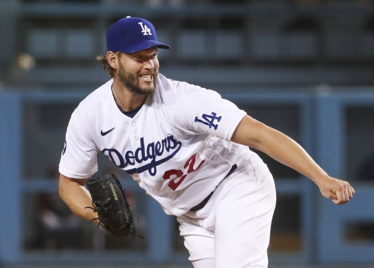 Dodgers starter Clayton Kershaw follows through after delivering a pitch Sept. 19, 2022. 