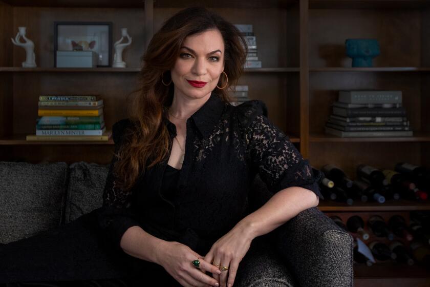 Culver City, CALIF. -- FRIDAY, FEBRUARY 17, 2023: Sera Gamble who serves as the showrunner of the Netflix deadly psychological drama "You,” sits for a portrait in her home office on Friday, February 17, 2023. (Brian van der Brug / Los Angeles Times)