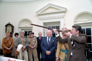 President Ronald Reagan, right, in the documentary "The Price of Freedom"