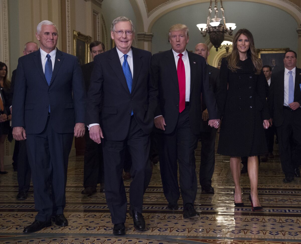 President-elect Donald Trump with Senate Majority Leader Mitch McConnell and Vice President-Elect Mike Pence, right, at the Capitol on Thursday.