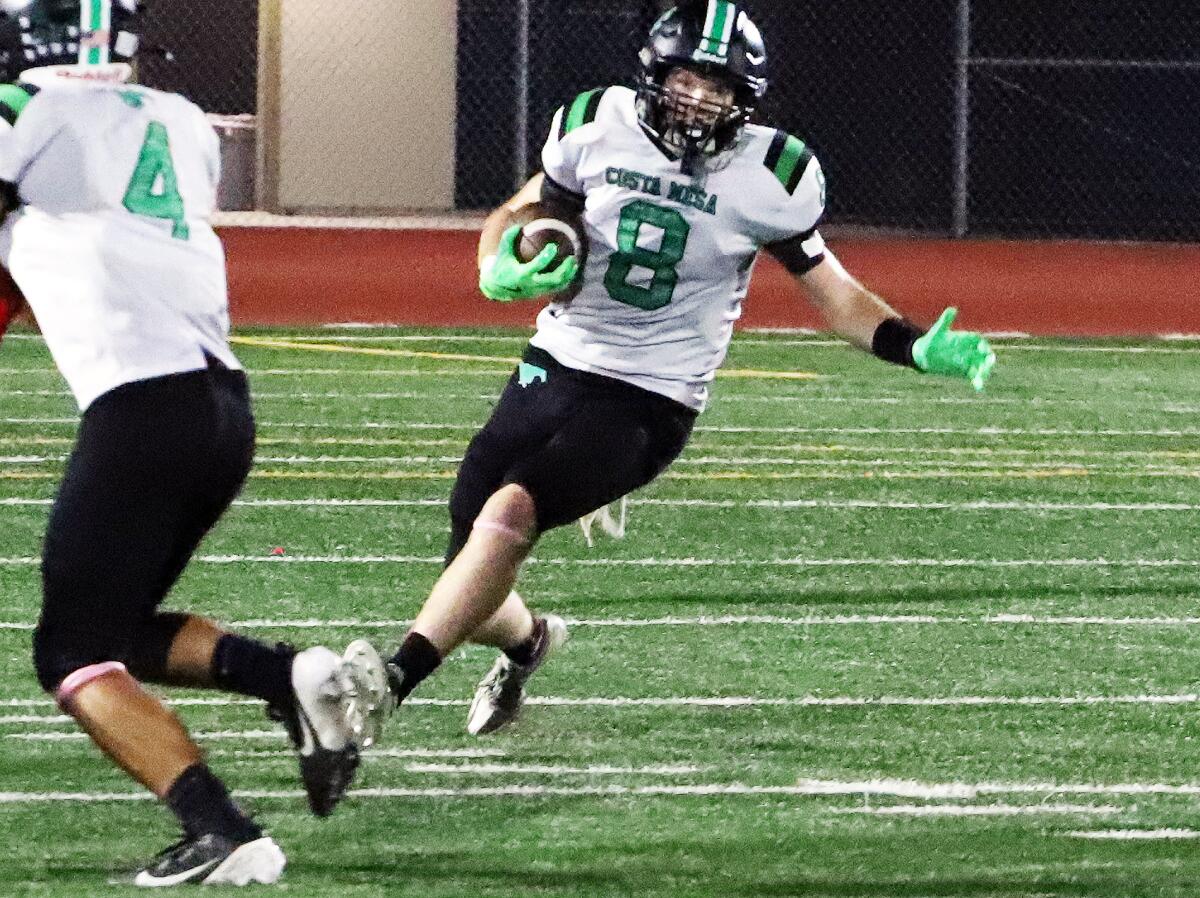 Costa Mesa's Caden Oliver (8) looks for an opening against Bolsa Grande in a Tango League game on Thursday.