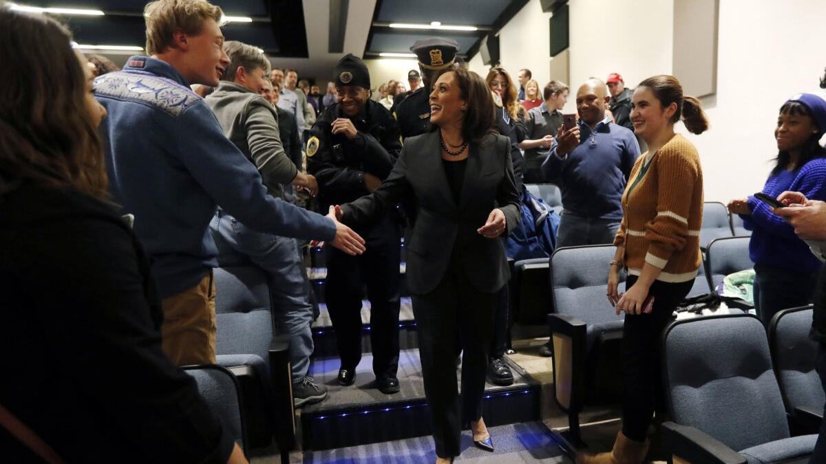 Sen. Kamala Harris greets students at Drake University Monday in Des Moines, Iowa.