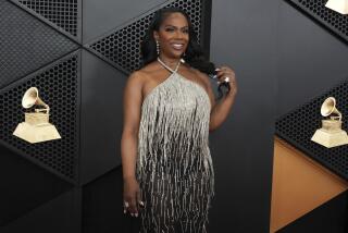 Kandi Burruss arrives at the 66th annual Grammy Awards on Sunday, Feb. 4, 2024, in Los Angeles. (Photo by Jordan Strauss/Invision/AP)