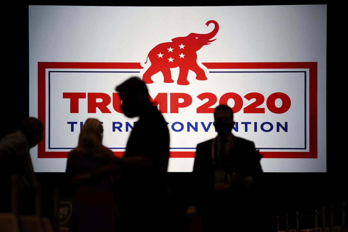 Delegates arrive for the scaled-back Republican National Convention in Charlotte, N.C.