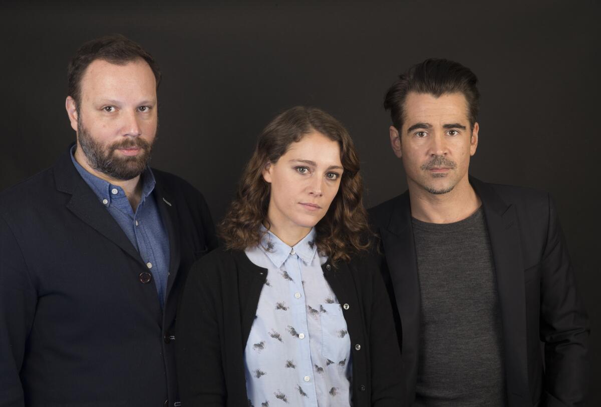"The Lobster" director Yorgos Lanthimos, left, with actors Ariane Labed and Colin Farrell.