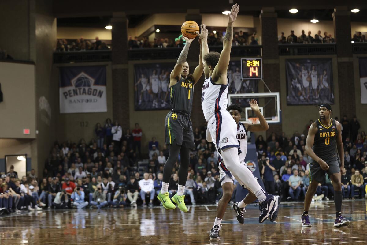 Baylor guard Keyonte George (1) shoots during the second half of an NCAA college basketball game against Gonzaga, Friday, Dec 2, 2022, in Sioux Falls, S.D. (AP Photo/Josh Jurgens)