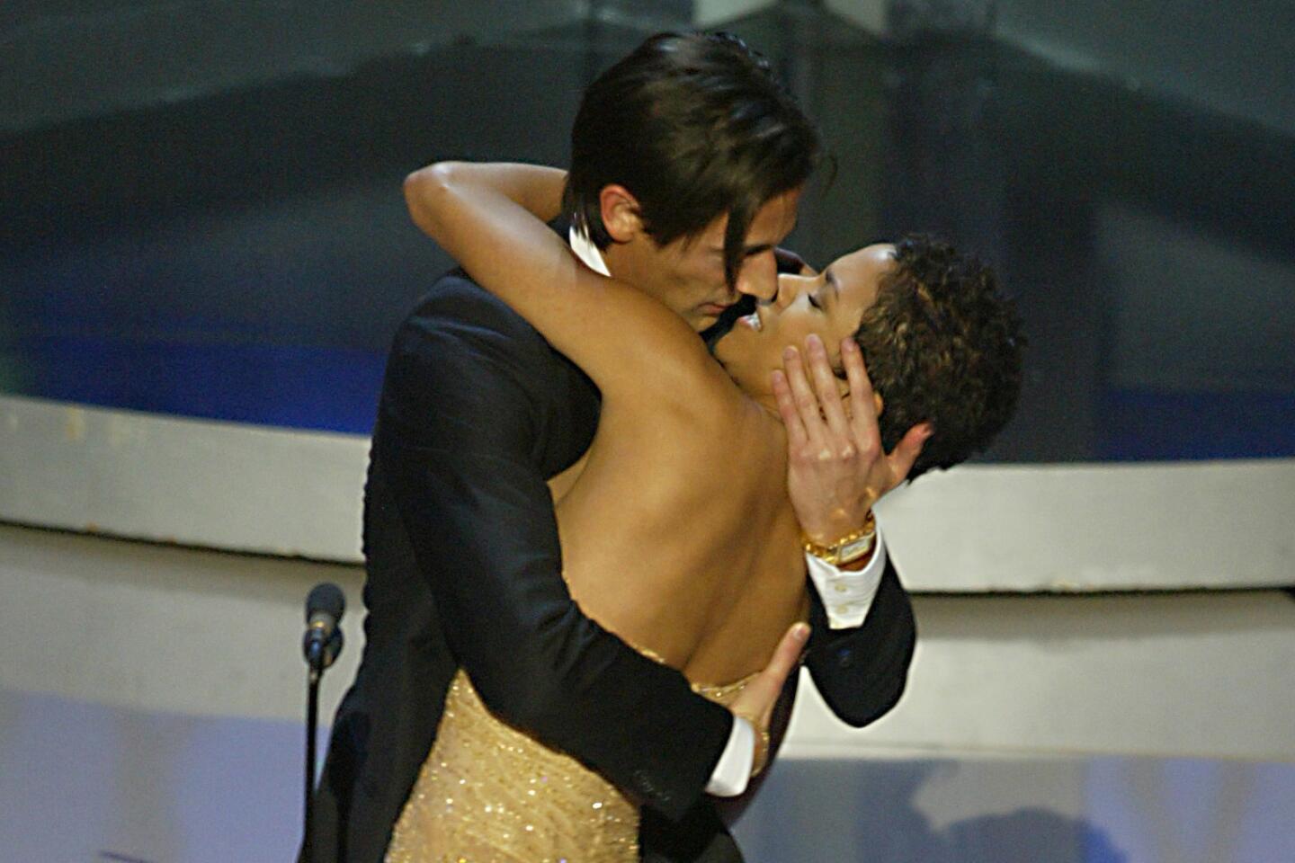 Apparently, when overcome with happiness, actor Adrien Brody's primal instinct tells him to latch his lips onto the pretty lady who gave him the news. Brody took everyone by surprise (especially Berry) when he kissed her after winning a lead actor Oscar for "The Pianist."