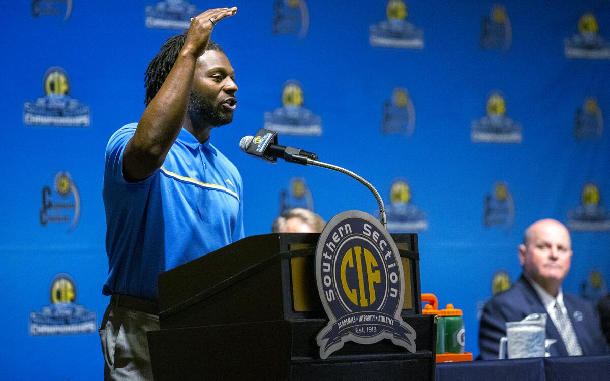 LaDainian Tomlinson speaks during the 45th annual CIF Southern Section football press luncheon at the Grand in Long Beach.