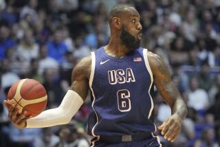 United States' forward LeBron James looks to pass the ball during an exhibition basketball game 
