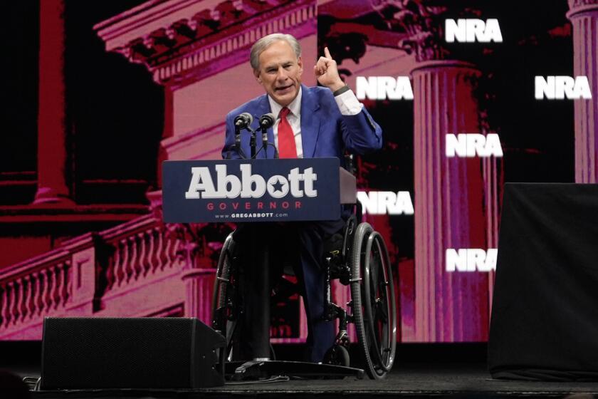 Texas Gov. Greg Abbott speaks before former President Donald Trump arrives at the National Rifle Association Convention, Saturday, May 18, 2024, in Dallas. (AP Photo/LM Otero)