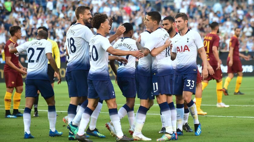 Fernando Llorente (2-L) of Tottenham Hotspur celebrates with teammates after scoring against AS Roma during their International Champions Cup match in San Diego on July 25, 2018, where Tottenham won 4-1.