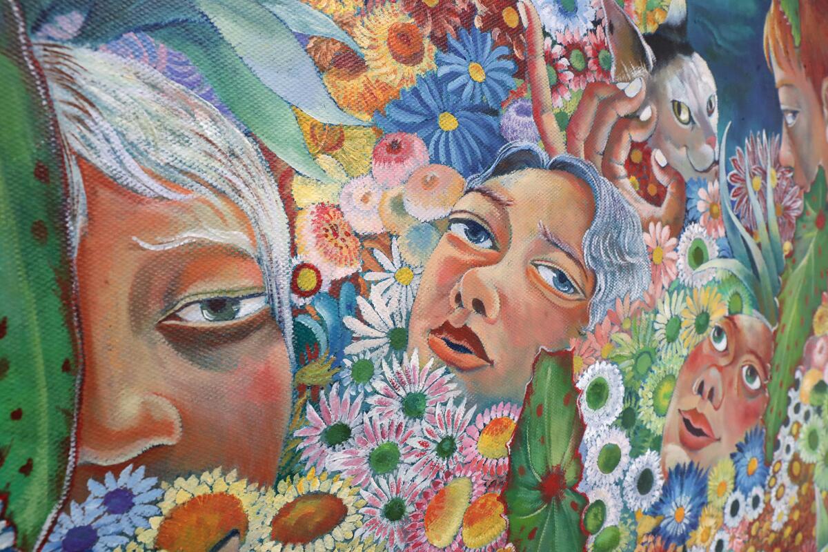 The faces in Bing Liu's "Spring #1 and #2," a mural painted with oil on canvas.