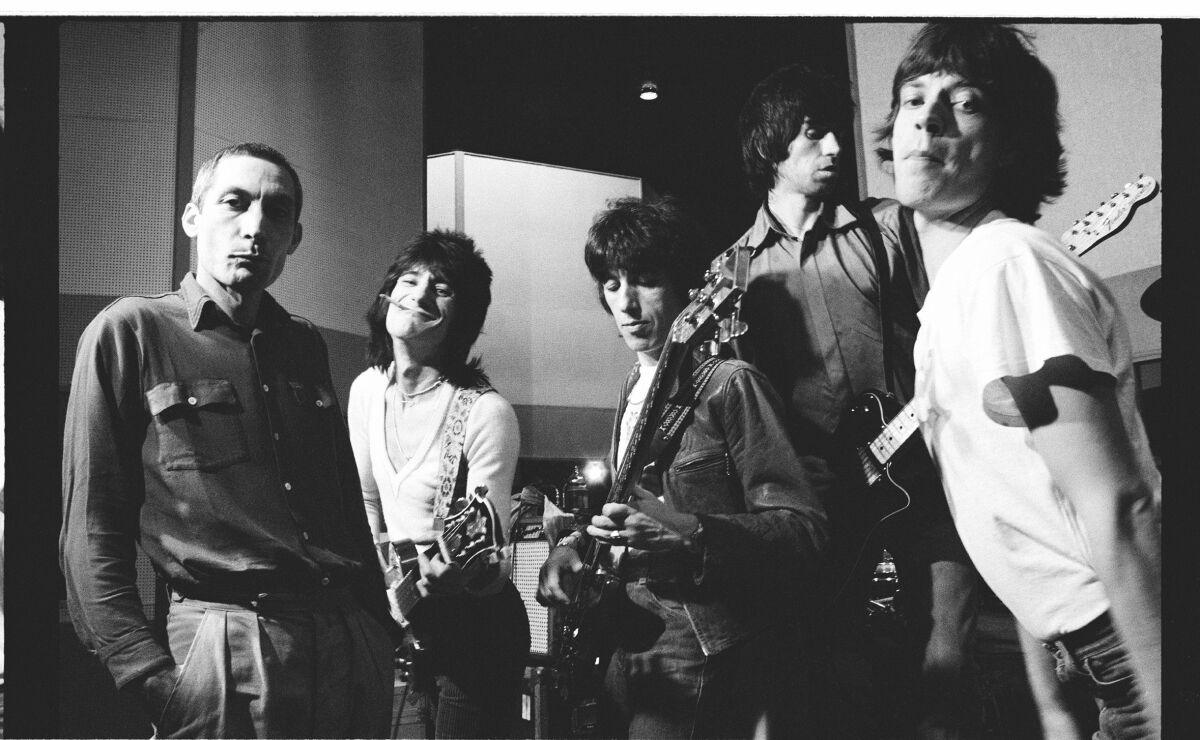 The Rolling Stones strike a rock 'n' roll pose.