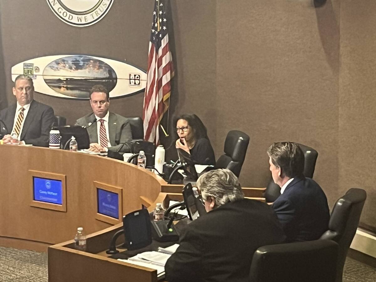 Huntington Beach City Councilwoman Rhonda Bolton, center, makes a point at Tuesday's meeting.