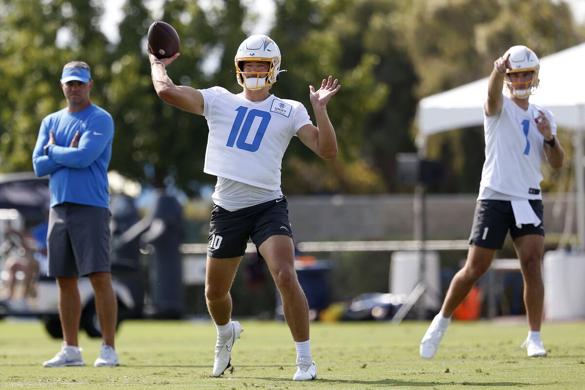 Chargers quarterback Justin Herbert throws at practice on Thursday.