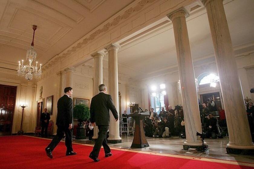 MEET THE PRESS: Samuel A. Alito Jr. and President Bush arrive to face the news media after an early Oval Office meeting.