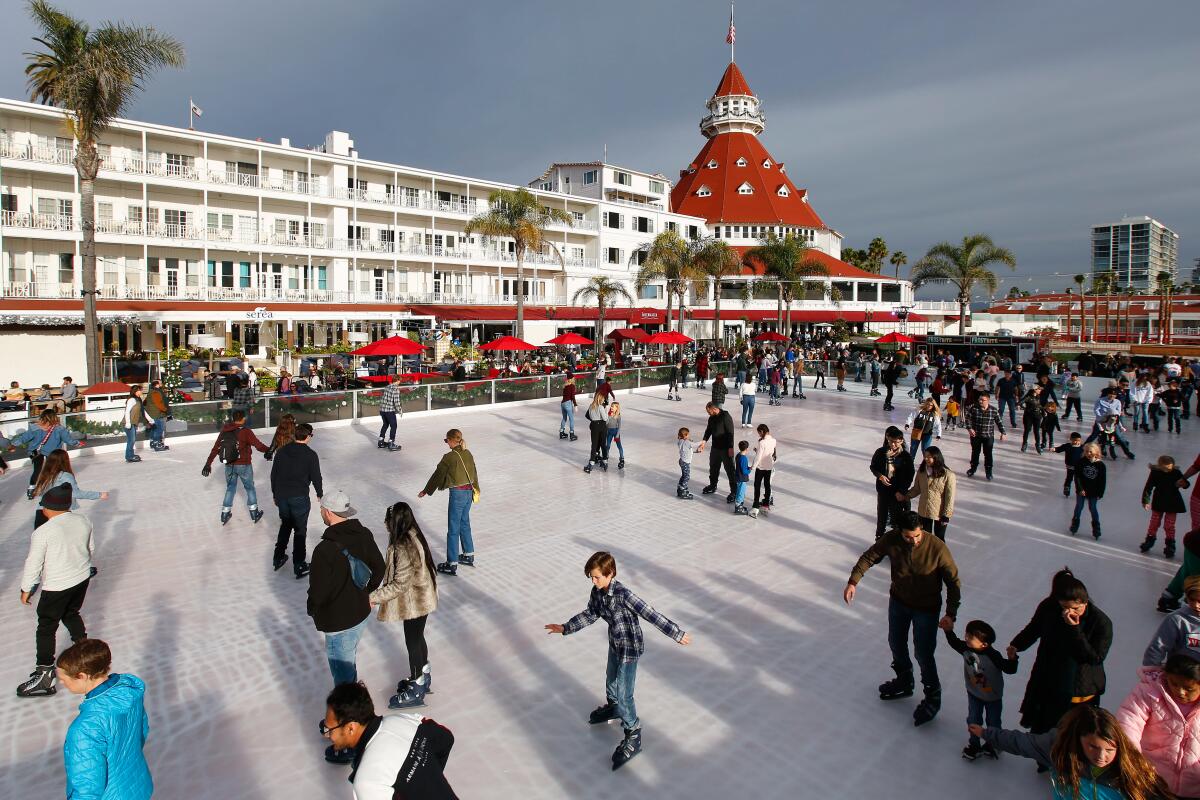 People skating on an ice rink.