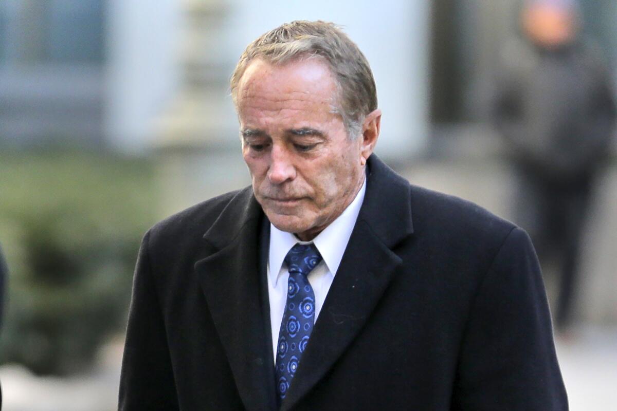 Former U.S. Rep. Chris Collins (R-N.Y.) arrives at federal court for sentencing Friday in New York. Collins pleaded guilty last fall to insider trading and lying to the FBI.