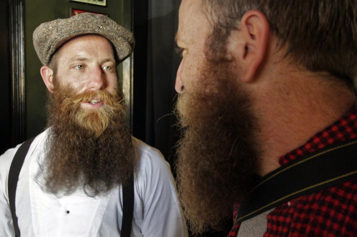 Full Beard contestants Matt Lee, left, and Tyler Williams at the Los Angeles Beard & Mustache Competition at the Federal Bar in North Hollywood on Aug. 14, 2011.