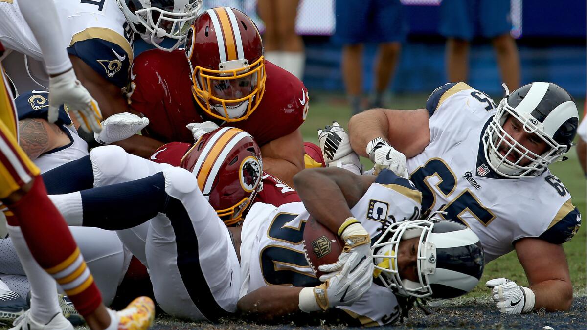 Rams running back Todd Gurley runs for a touchdown against the Redskins in the second quarter on Sunday.