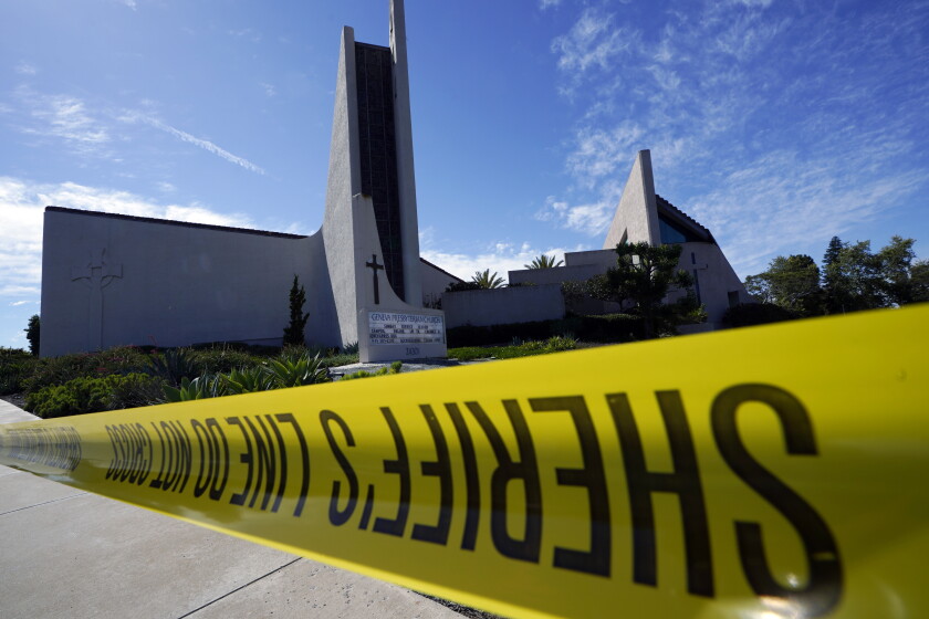 Crime scene tape is stretched across an area at Geneva Presbyterian Church.